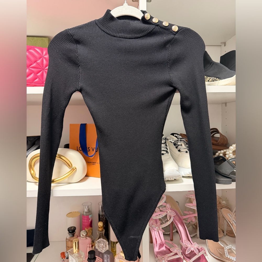 Black Ribbed Turtleneck Sweater